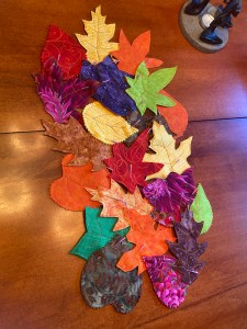 Felt backed 'leaves' as a table runner.